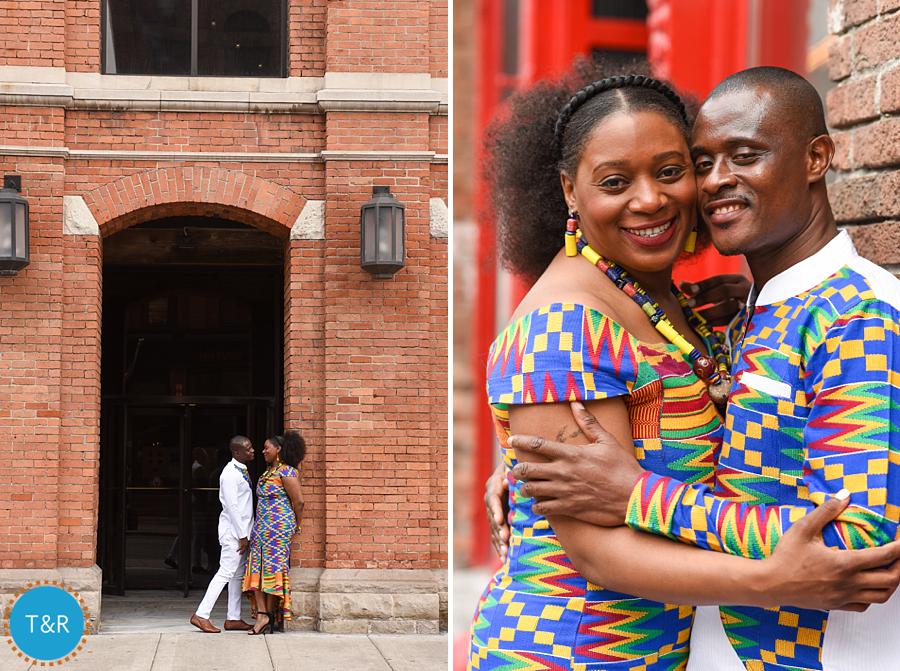 A couple goes in for a kiss in front of a historic Greektown building