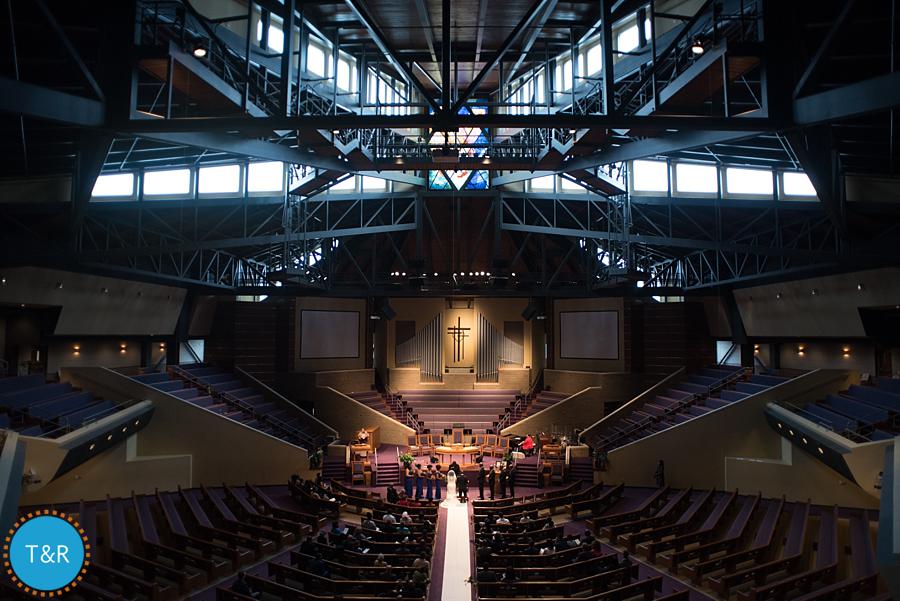 A wide view showing the architecture of Tabernacle Missionary Baptist Church during a wedding