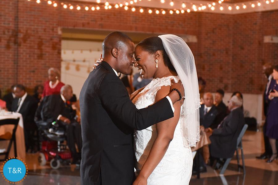 A wedding couple takes to the dance floor for their first dance at Detroit's Rattlesnake Club