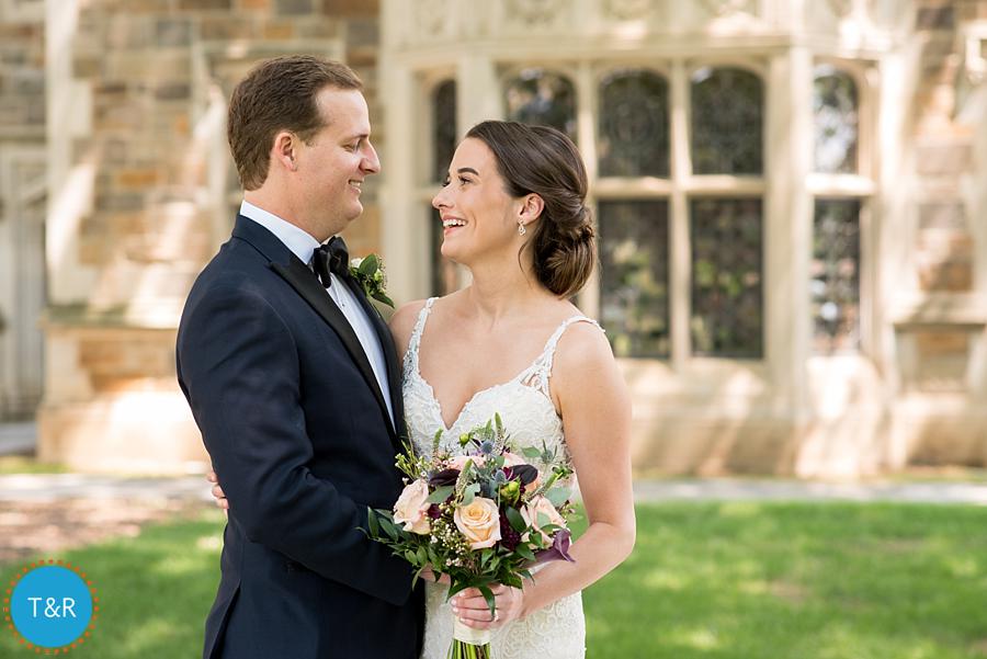 Katie and Drew, smiling at each other