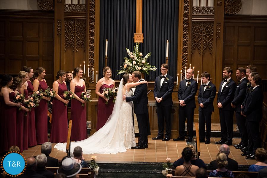 Katie and Drew kissing for the first time as husband and wife.