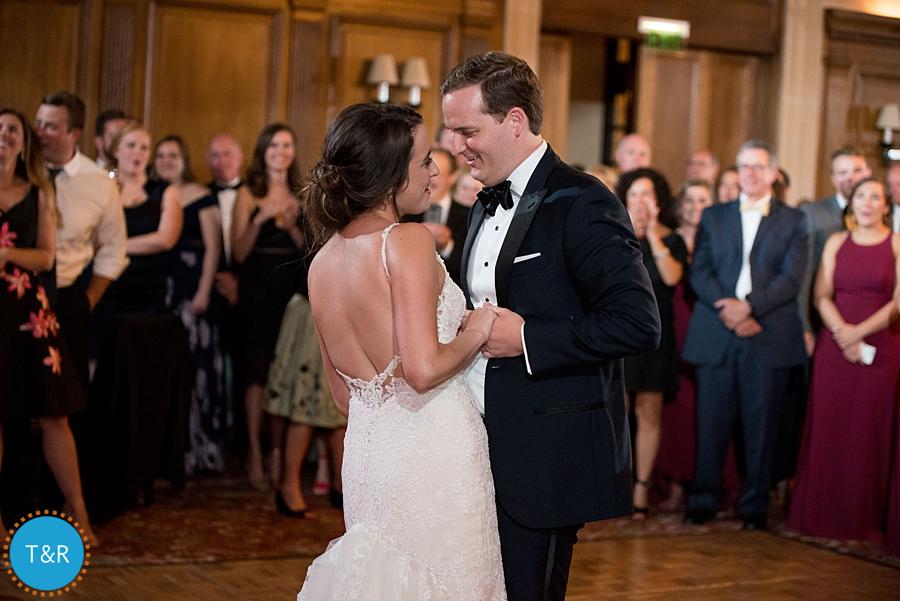 Bride and groom dancing together