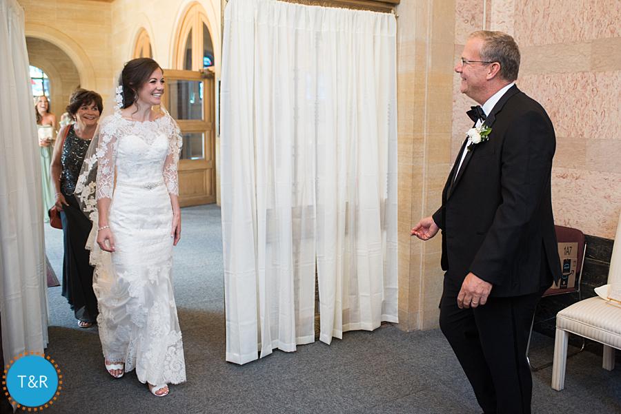 bride gets first look from her father on her wedding day