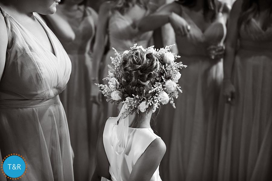 Flowers in a flower girl's hair at Frutig Farms The Valley in Ann Arbor, MI