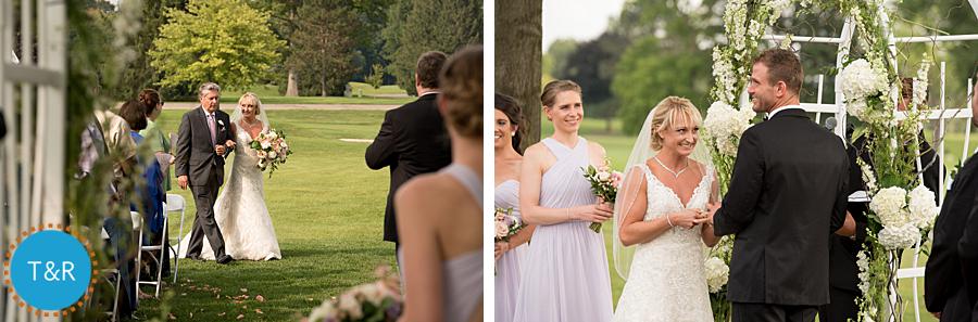 Bride and Groom during their wedding ceremony at Travis Pointe Country Club