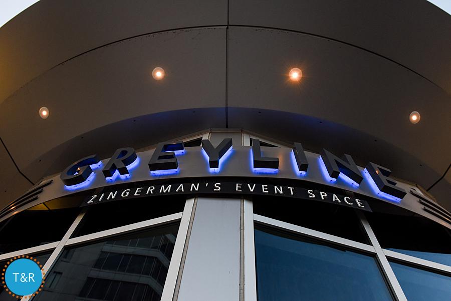 Exterior neon sign of Zingerman's Greyline in Ann Arbor