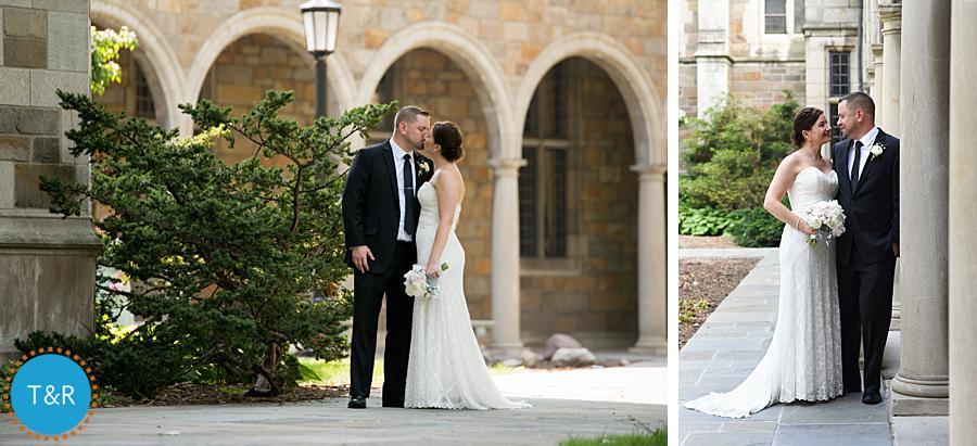 Bride and groom smile and kiss during Ann Arbor wedding photos at U of M's Law Quad