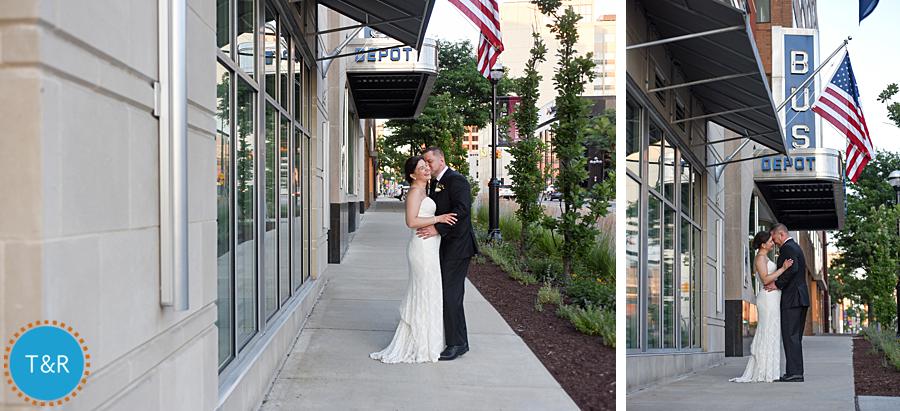 Bride and groom embrace outside of Zingerman's Greyline in Ann Arbor during their wedding reception