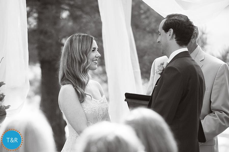 Bride and groom saying their wedding vows during their Frutig Farms Misty Farm wedding ceremony