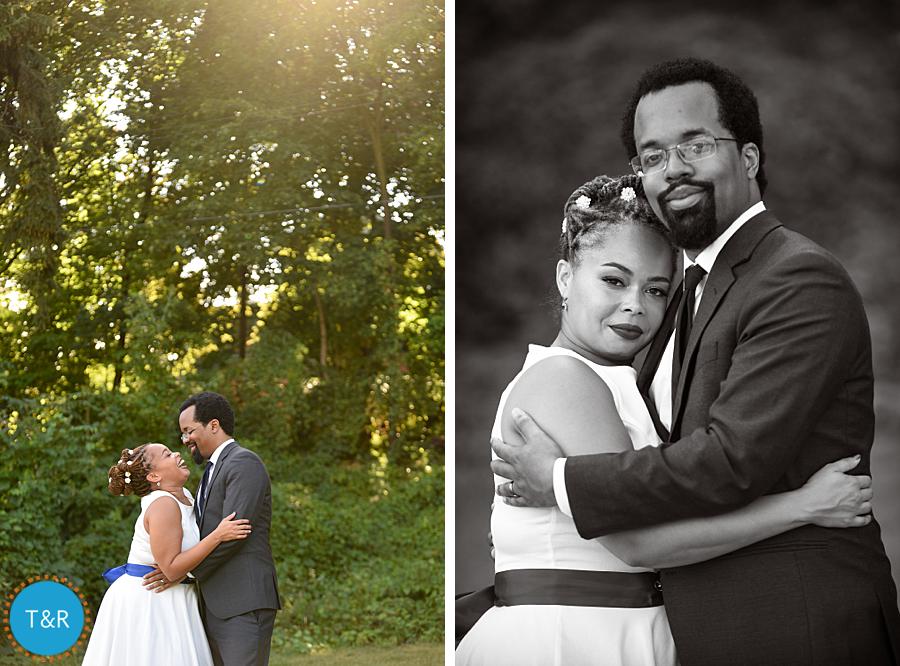 Bride and groom laugh and hug against a backdrop of trees and sunshine at their Ypsilanti wedding